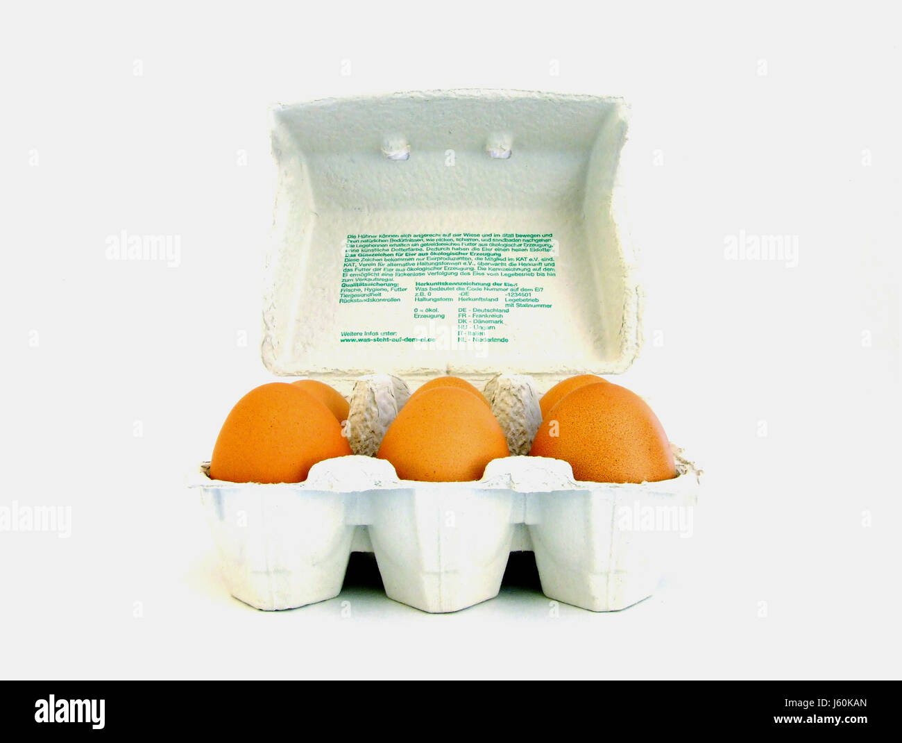 brown brownish brunette egg chicken eggs chickens hens cardboard carton packing Stock Photo