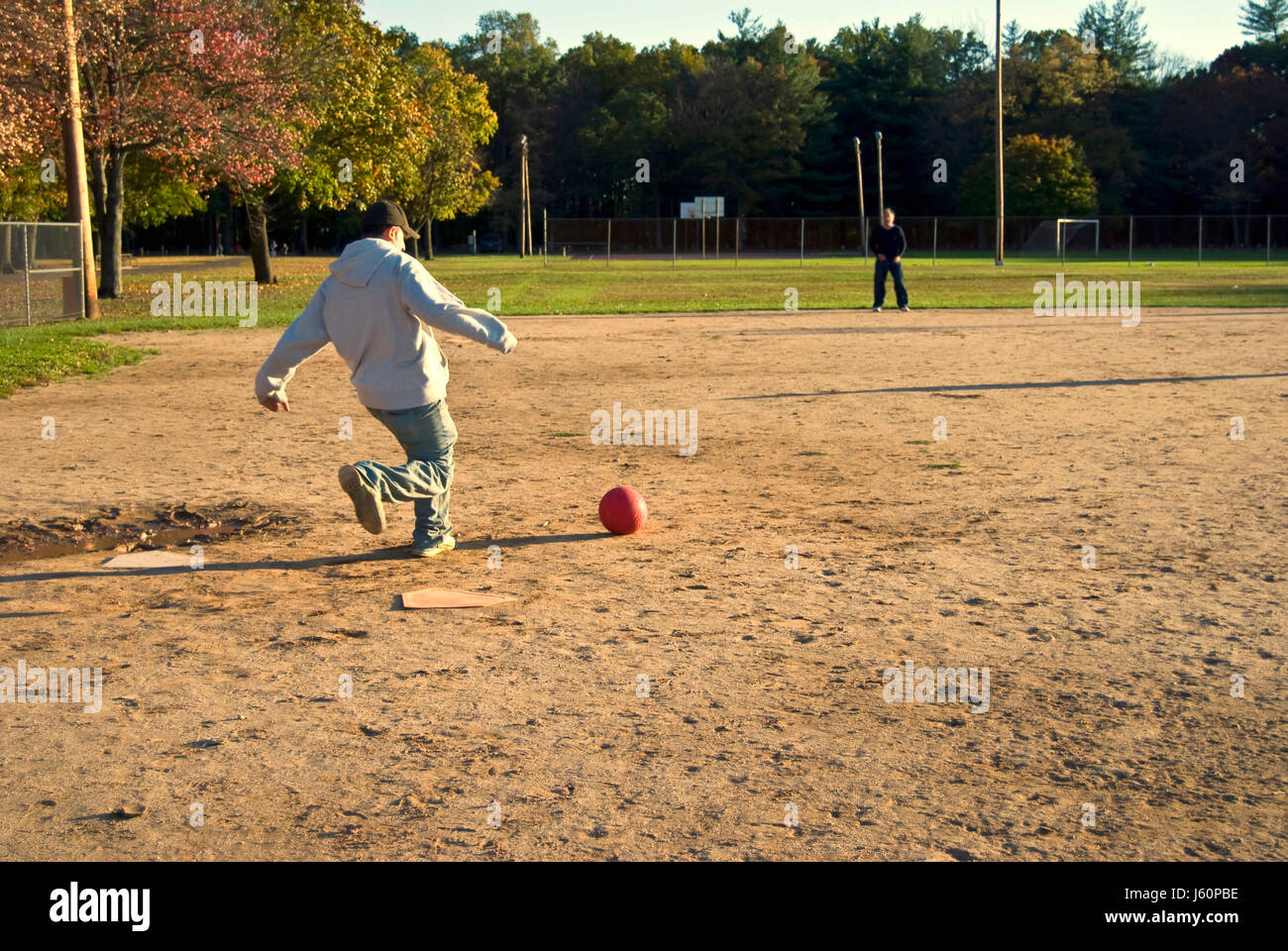 Kids playing kickball hires stock photography and images Alamy