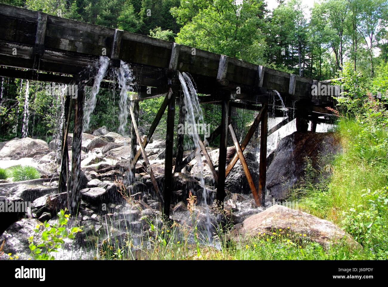 historical wood aqueduct conduit waterpower sawmill cable current