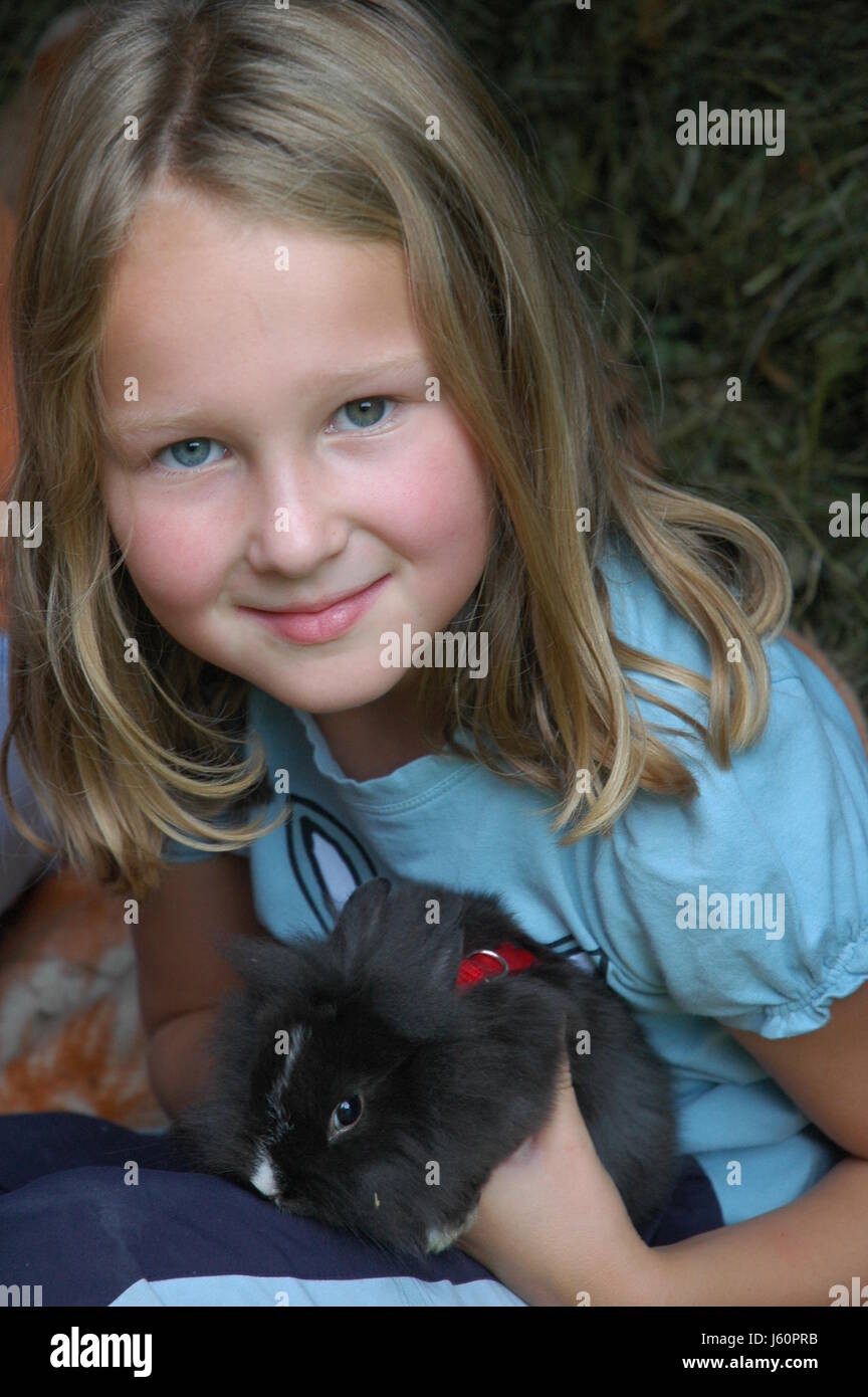girl with rabbit Stock Photo - Alamy