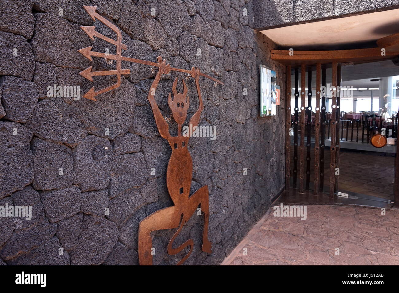 Timanfaya NaEl Diablo Restaurant cooking food using heat from the ground in the volcanic active area of Timanfaya National Park, Lanzarote, Canary Isl Stock Photo