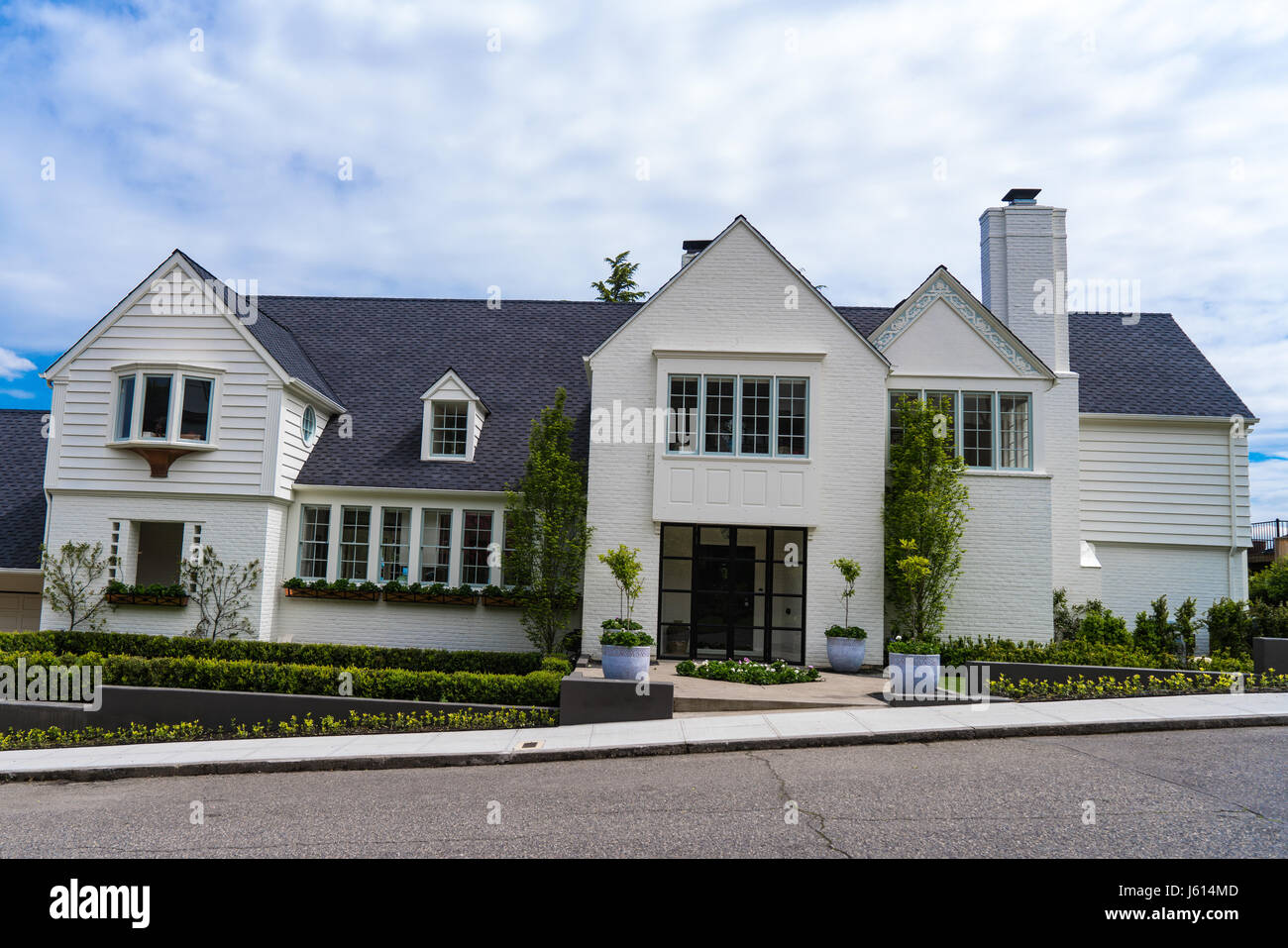 Expensive Suburban White Brick House With Landscaping Stock Photo Alamy