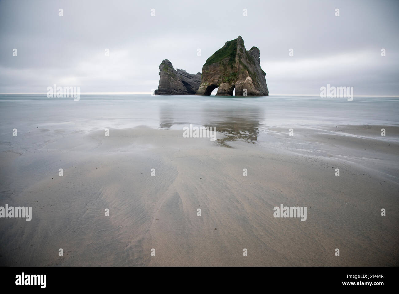 Spit With Rocks Farewell Spit New Zealand beach Rock haystacks Stock Photo - Alamy