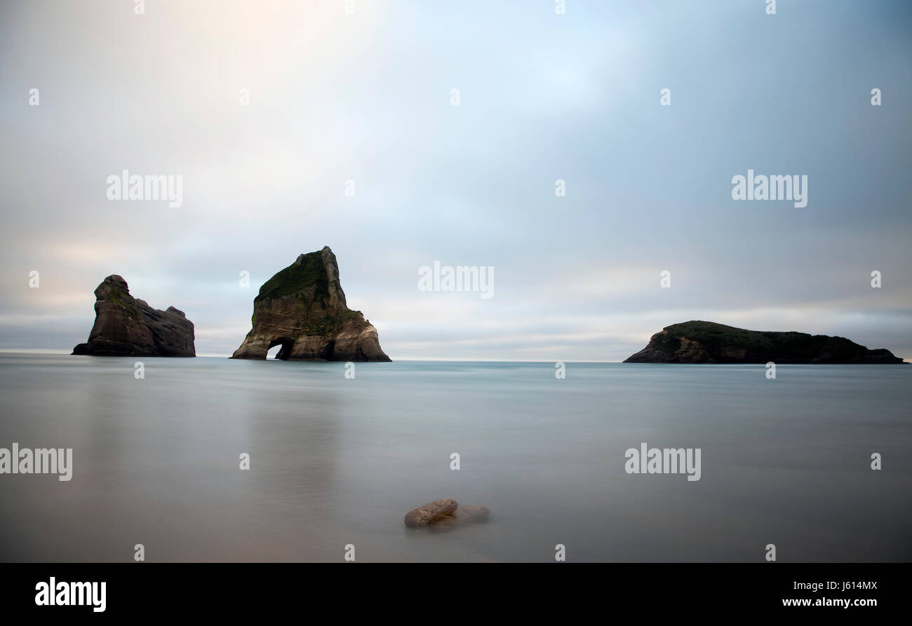 Spit With Rocks Farewell Spit New Zealand beach Rock haystacks Stock Photo - Alamy