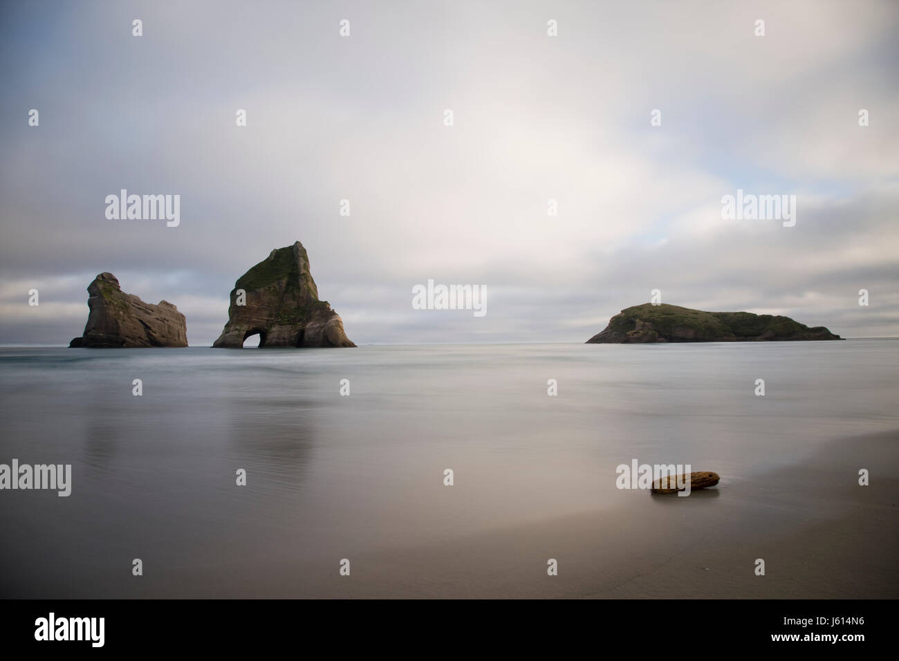 Spit With Rocks Farewell Spit New Zealand beach Rock haystacks Stock Photo - Alamy
