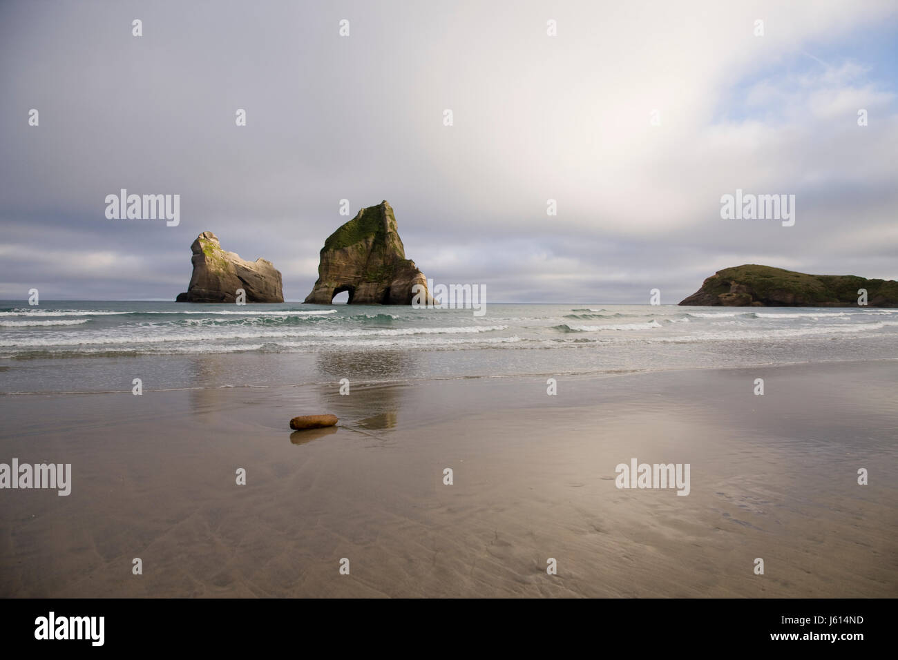 Spit With Rocks Farewell Spit New Zealand beach Rock haystacks Stock Photo - Alamy