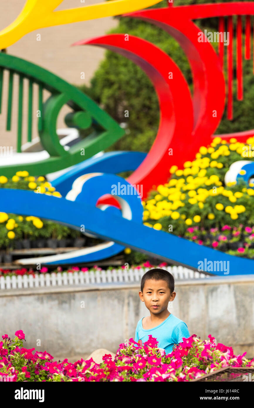 Chinese boy playing in the park, Yinchuan, Ningxia, China Stock Photo