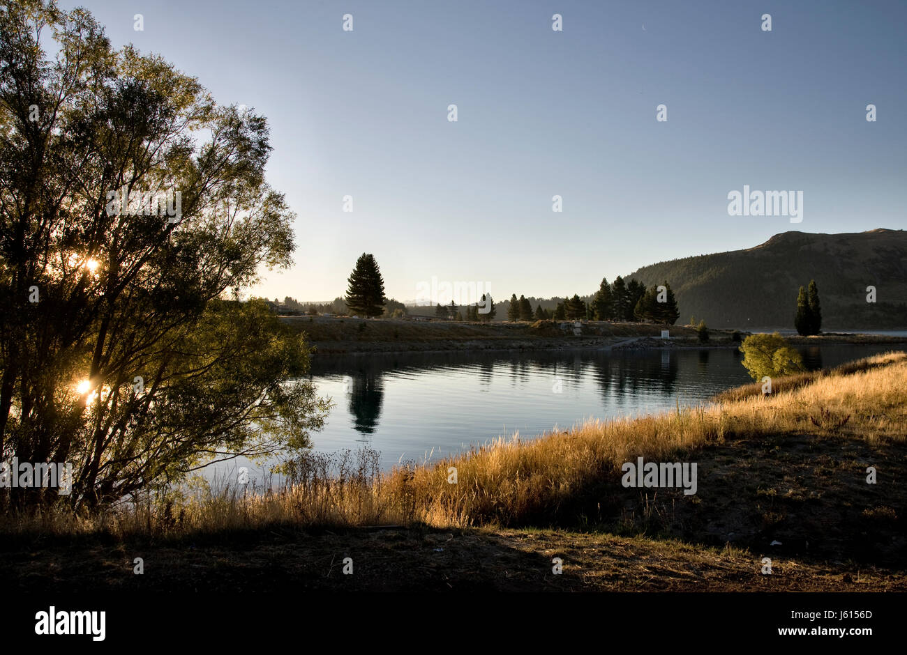 Lake Tekapo New Zealand sunset Light on the lake Stock Photo - Alamy