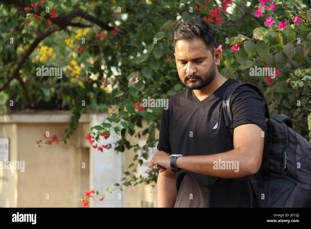 Young indian man thinking looking hi-res stock photography and images ...