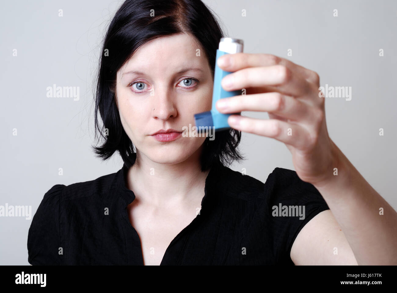 allergy disease asthma allergic inhaler woman indicate show meditative