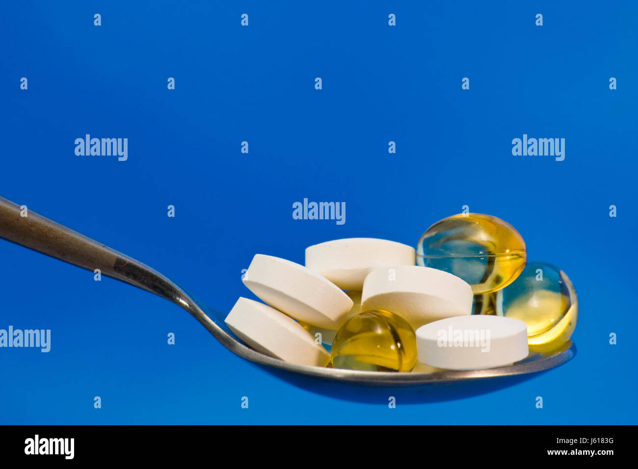 means agent medicine drug remedy substance tablets spoon health isolated Stock Photo Alamy
