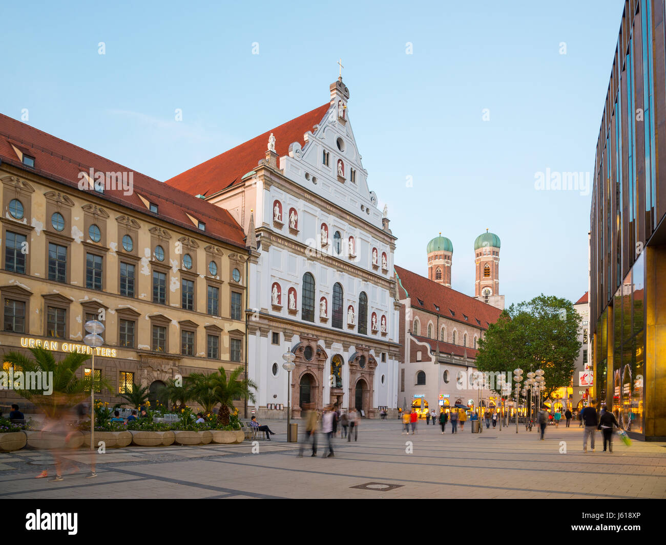 Munich, Germany - June 6, 2016: Neuhauser Street in Munich at the sunset, Germany Stock Photo