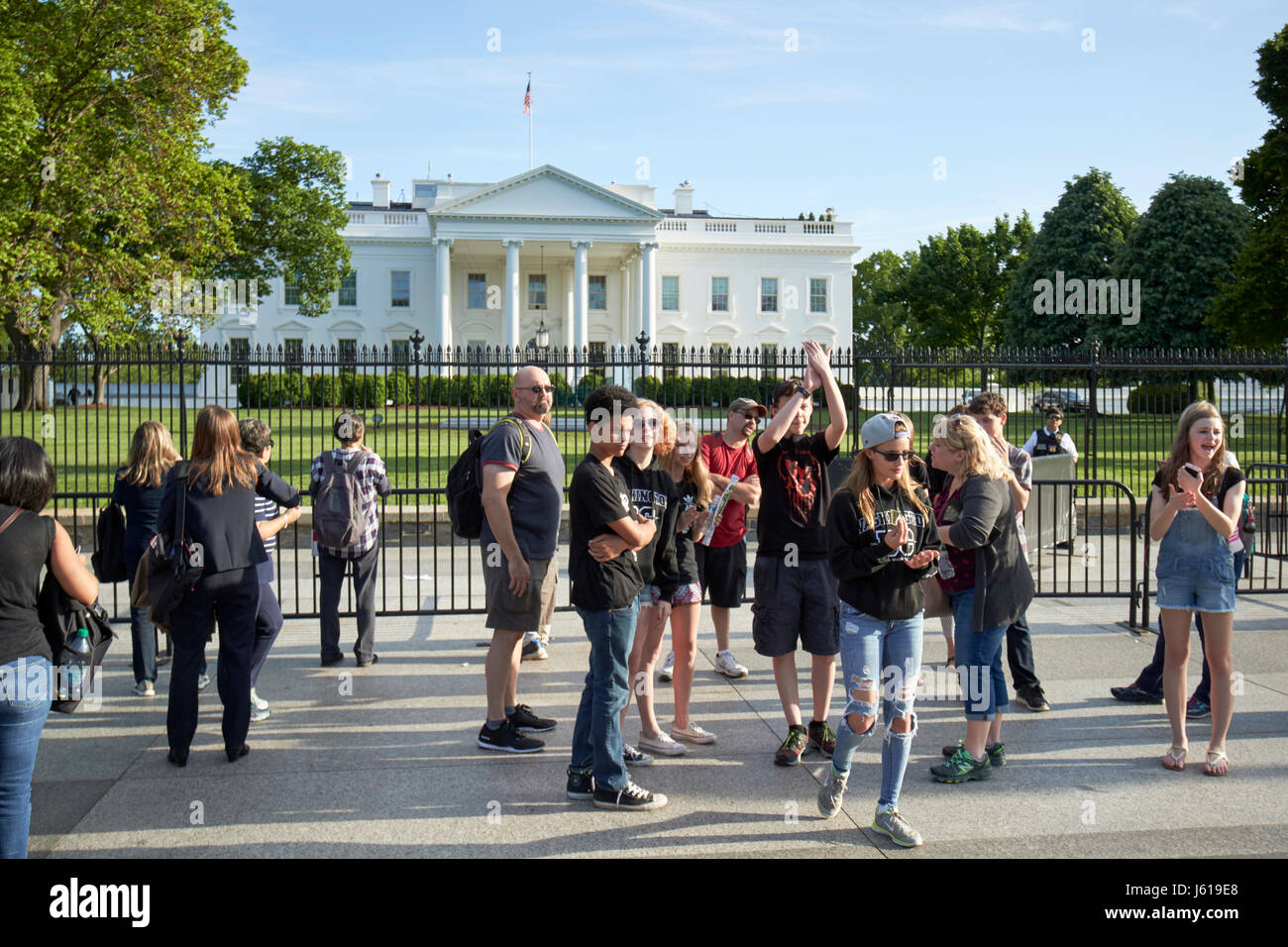 tourists outside the north facade from pennsylvania avenue the white house Washington DC USA Stock Photo