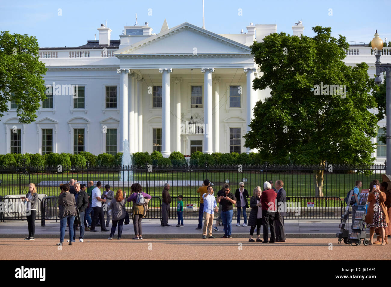 tourists outside the north facade from pennsylvania avenue the white house Washington DC USA Stock Photo