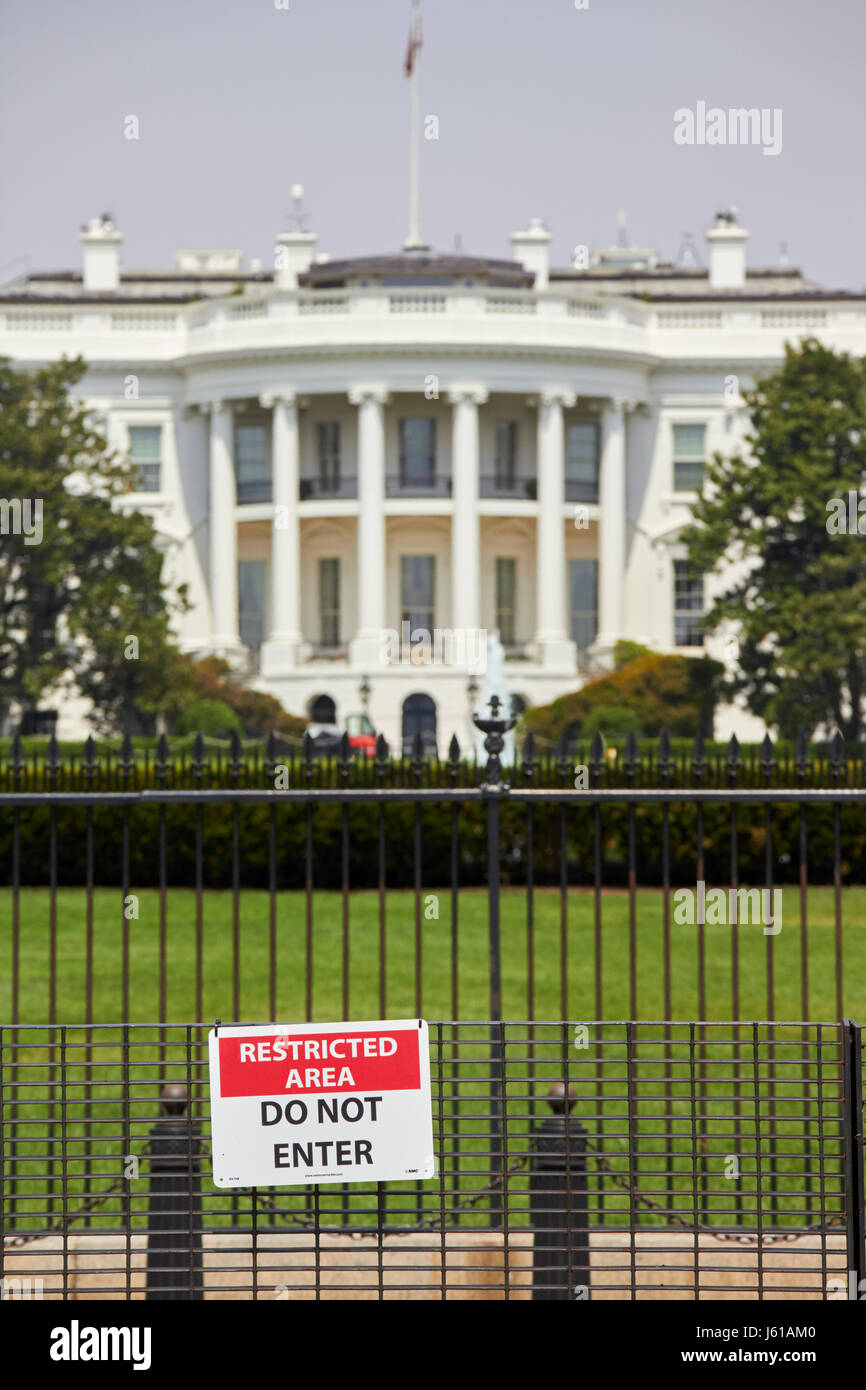 security fence and restricted area signs at the south facade of the white house Washington DC USA Stock Photo