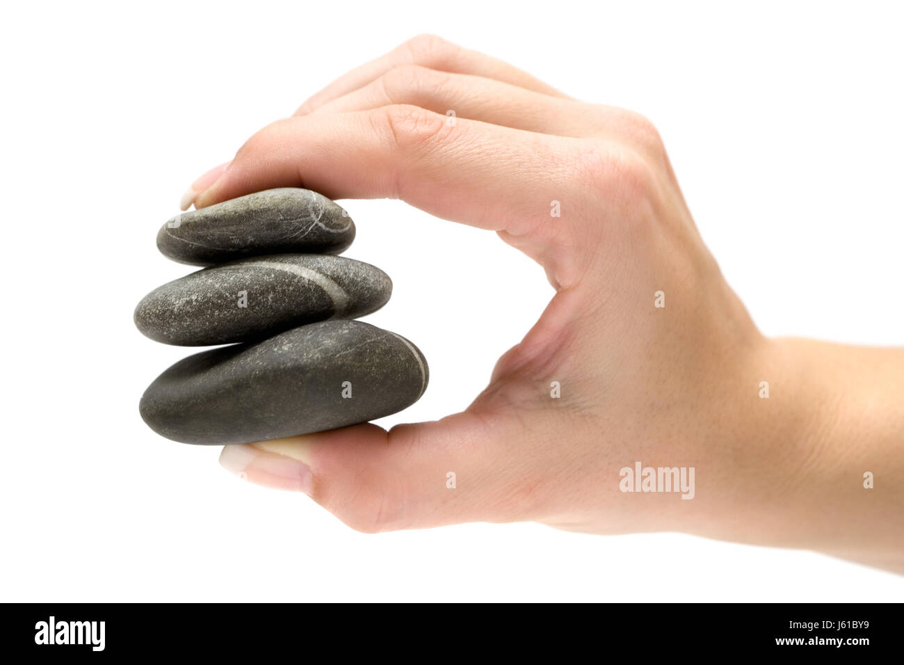 hand meditation harmony stacked pebbles nature stones hand hands finger Stock Photo