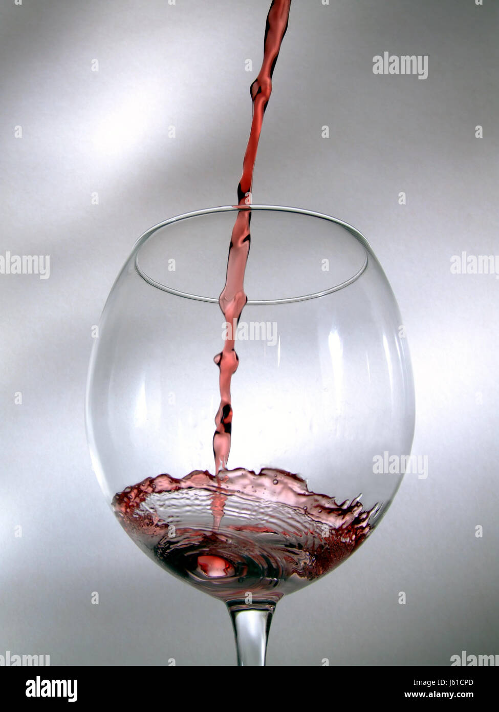glass chalice tumbler wine alcohol red wine drugs red drop drip drops seeping Stock Photo