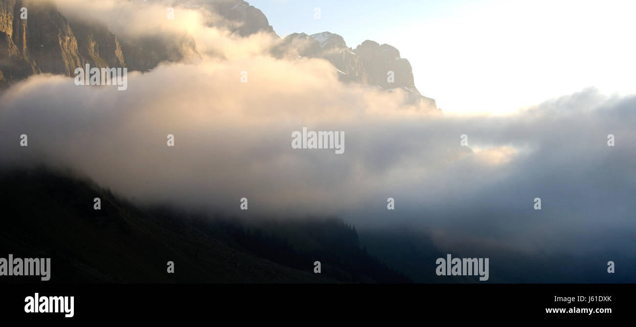 morning fog on the klausen pass,urnerboden,switzerland Stock Photo