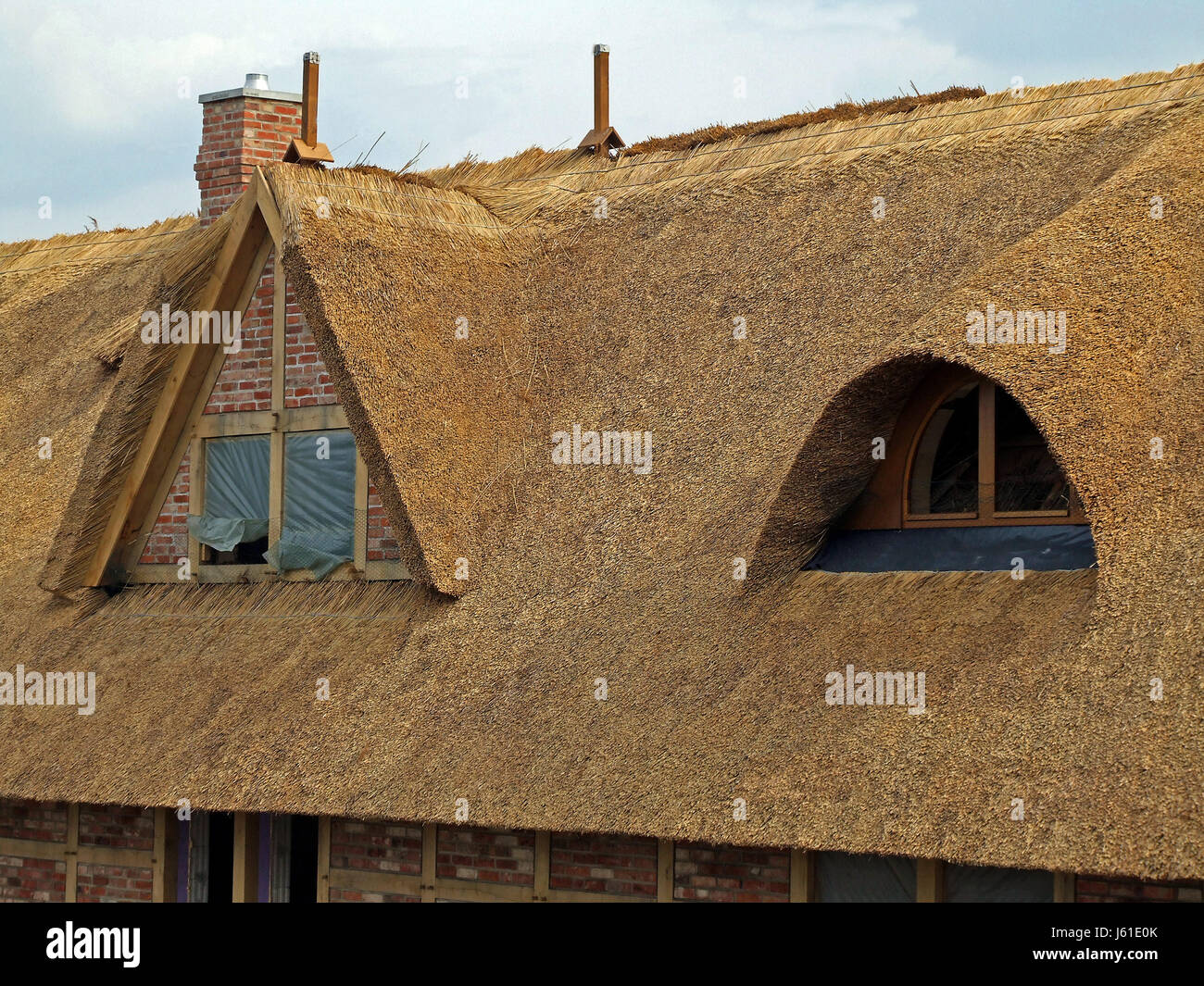 build new building gable thatched roof housebuild rooftop build new building Stock Photo Alamy