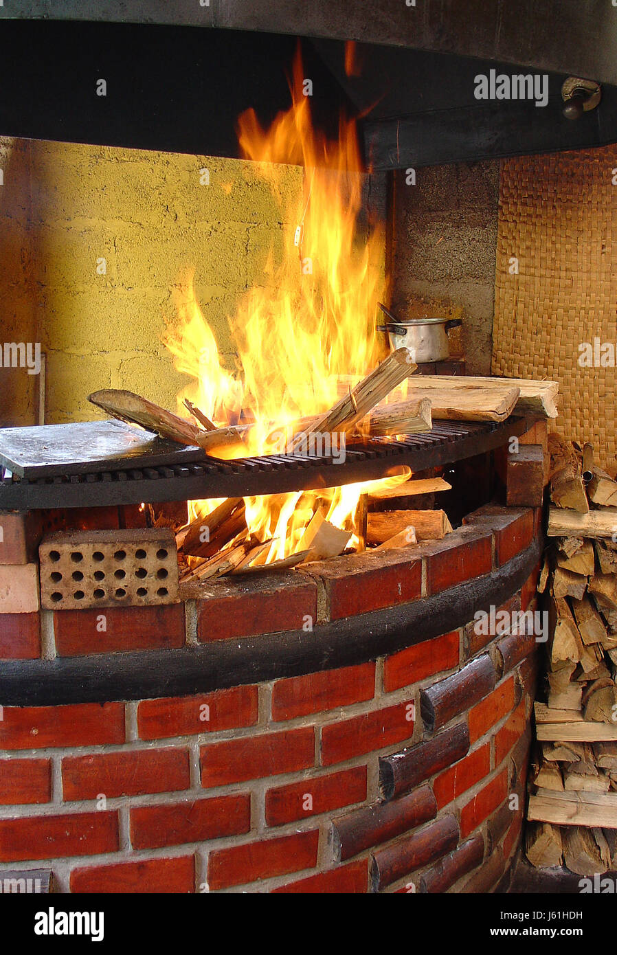 wood fire conflagration flame flames brick burning cook oven grill