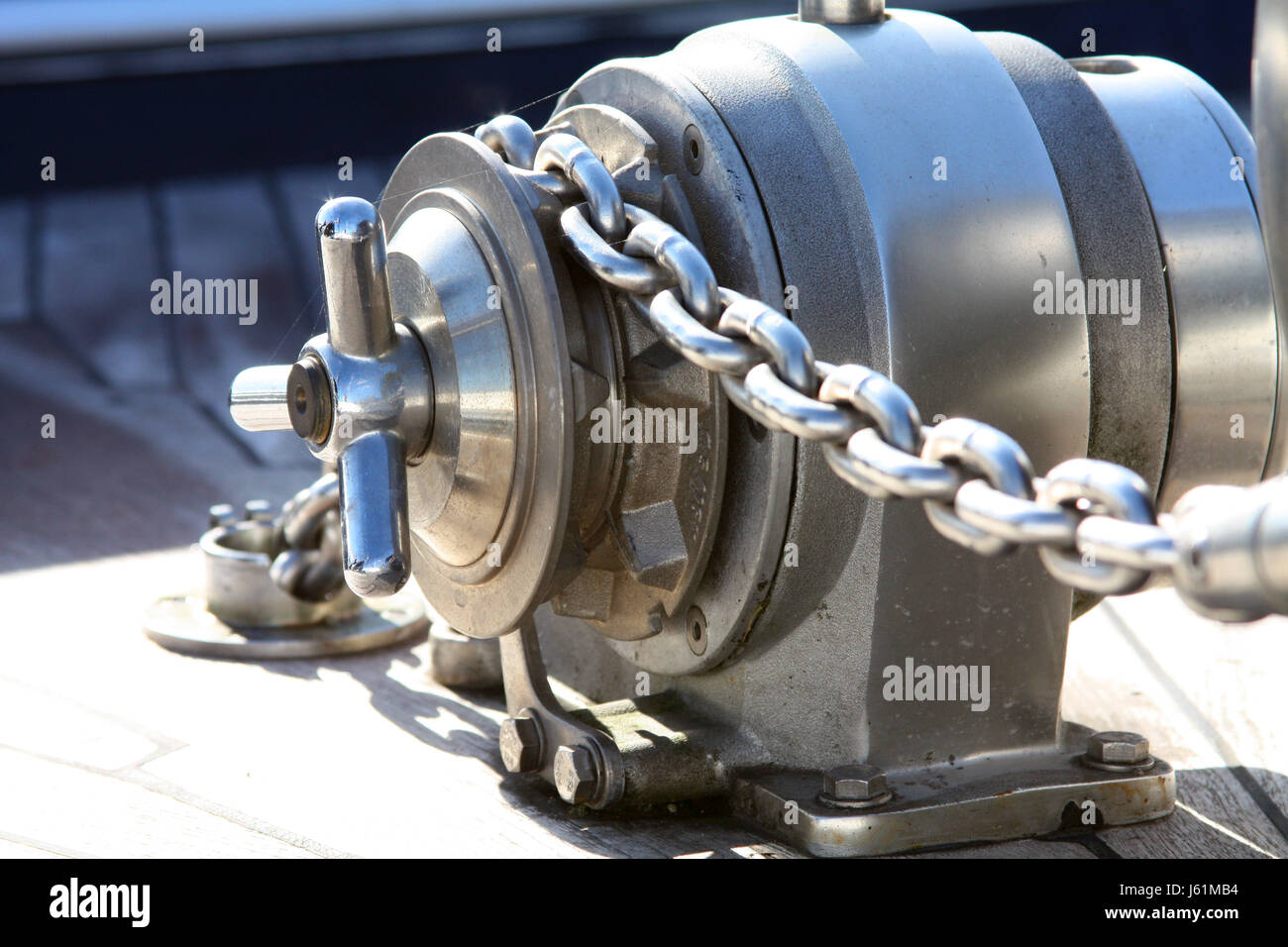 detail chain metal reflection windlass rowing boat sailing boat sailboat boat Stock Photo