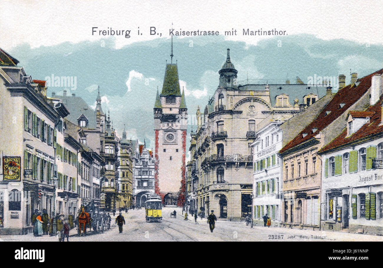 Vintage postcard of Freiburg im Breisgau, Baden-Württemberg, Germany, showing Kaiserstrasse (Kaiser-Joseph-Straße) and the Martinstor, one of the old city gates. Stock Photo