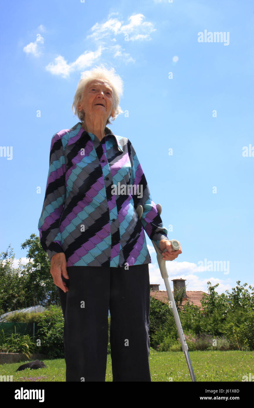 granny with crutch Stock Photo - Alamy