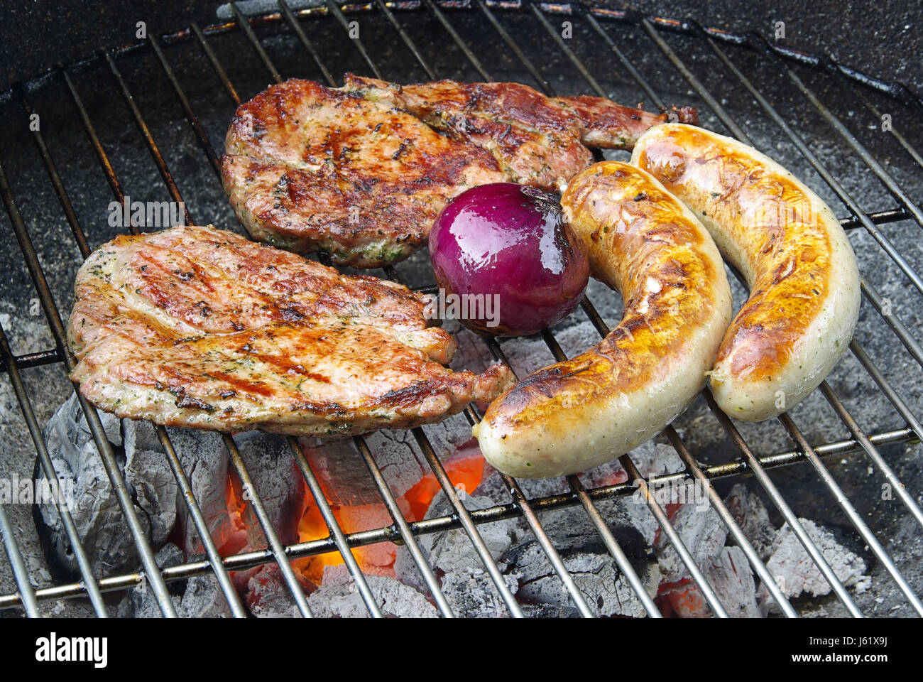 sausage grill barbecue barbeque steak pig meat food aliment boil cooks boiling Stock Photo