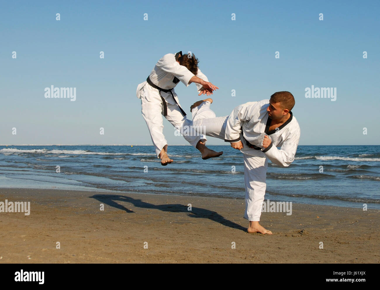 men man sport sports fight fighting beach seaside the beach seashore