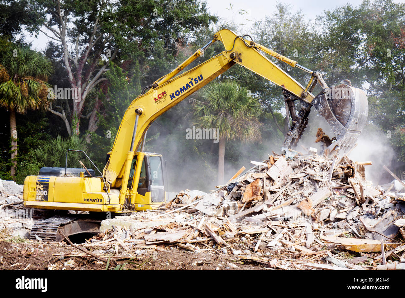 Beaufort South Carolina,Bay Street,building,demolition,demolish,tear down,raze,razing,site,structure,wood wooden,rubble,Komatsu,heavy equipment,machin Stock Photo