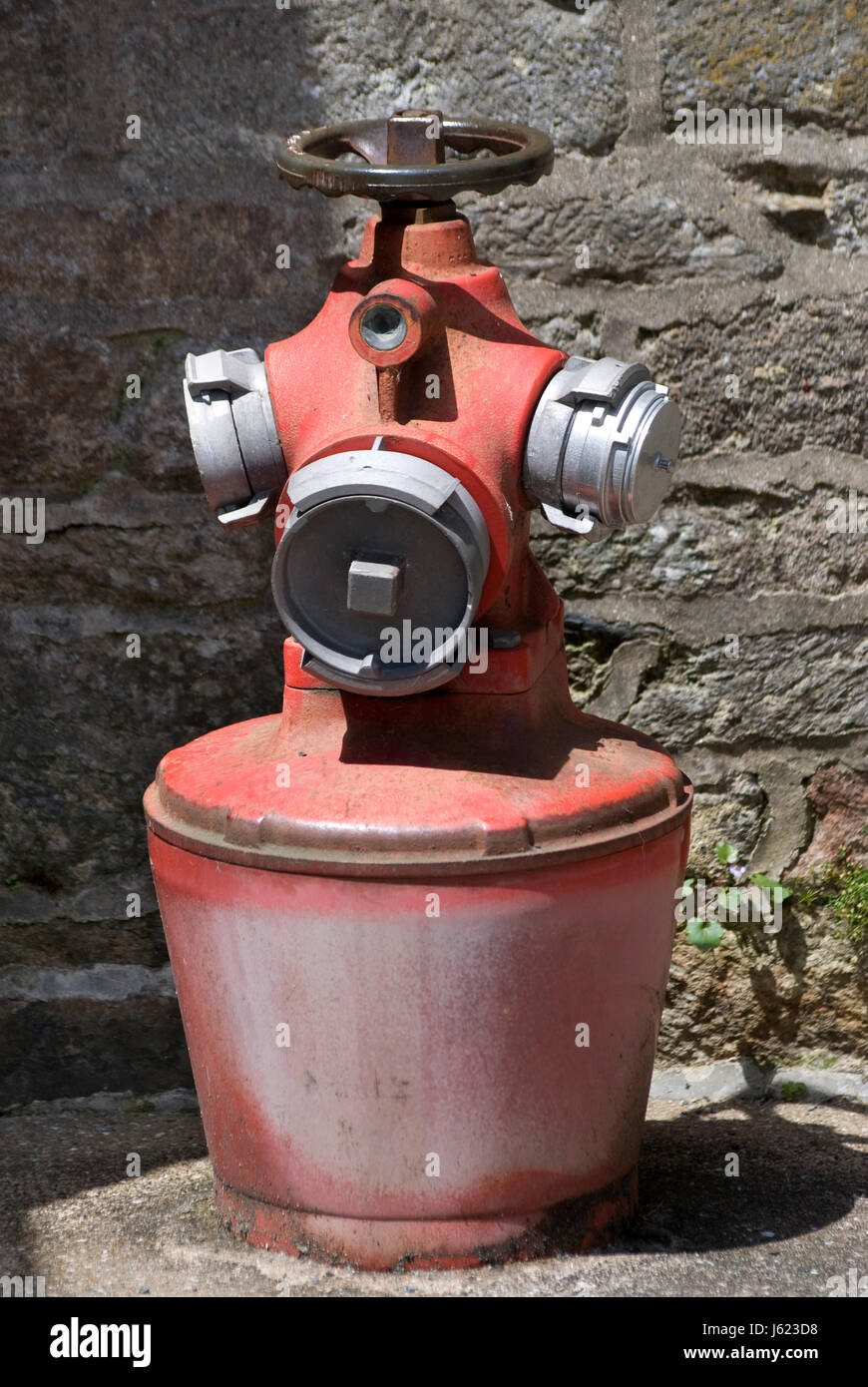 tap fireplug water supply red shine shines bright lucent light serene luminous Stock Photo