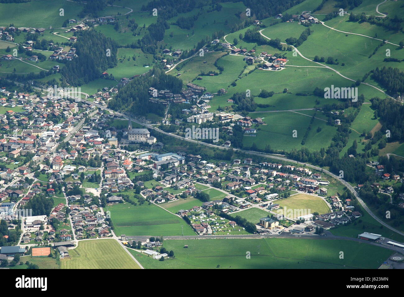 aerial photograph houses church city town austrians fields sight view outlook Stock Photo