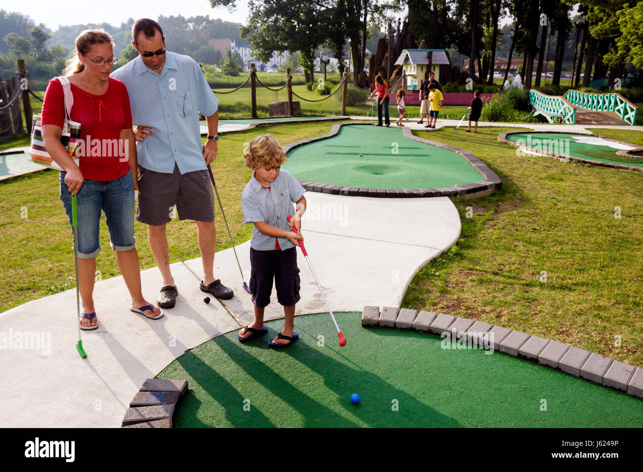 Valparaiso Indiana,Zao Island Entertainment Center,centre,miniature golf,fountains,family families parent parents child children,entertainment,man men Stock Photo