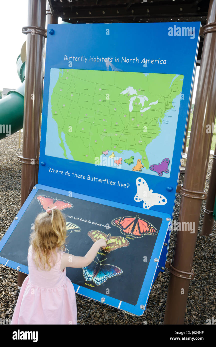 Valparaiso Indiana,Butterfly Meadow,theme playground,girl girls,youngster,female kids children preschooler,child,insects,colorful sign,interactive,edu Stock Photo