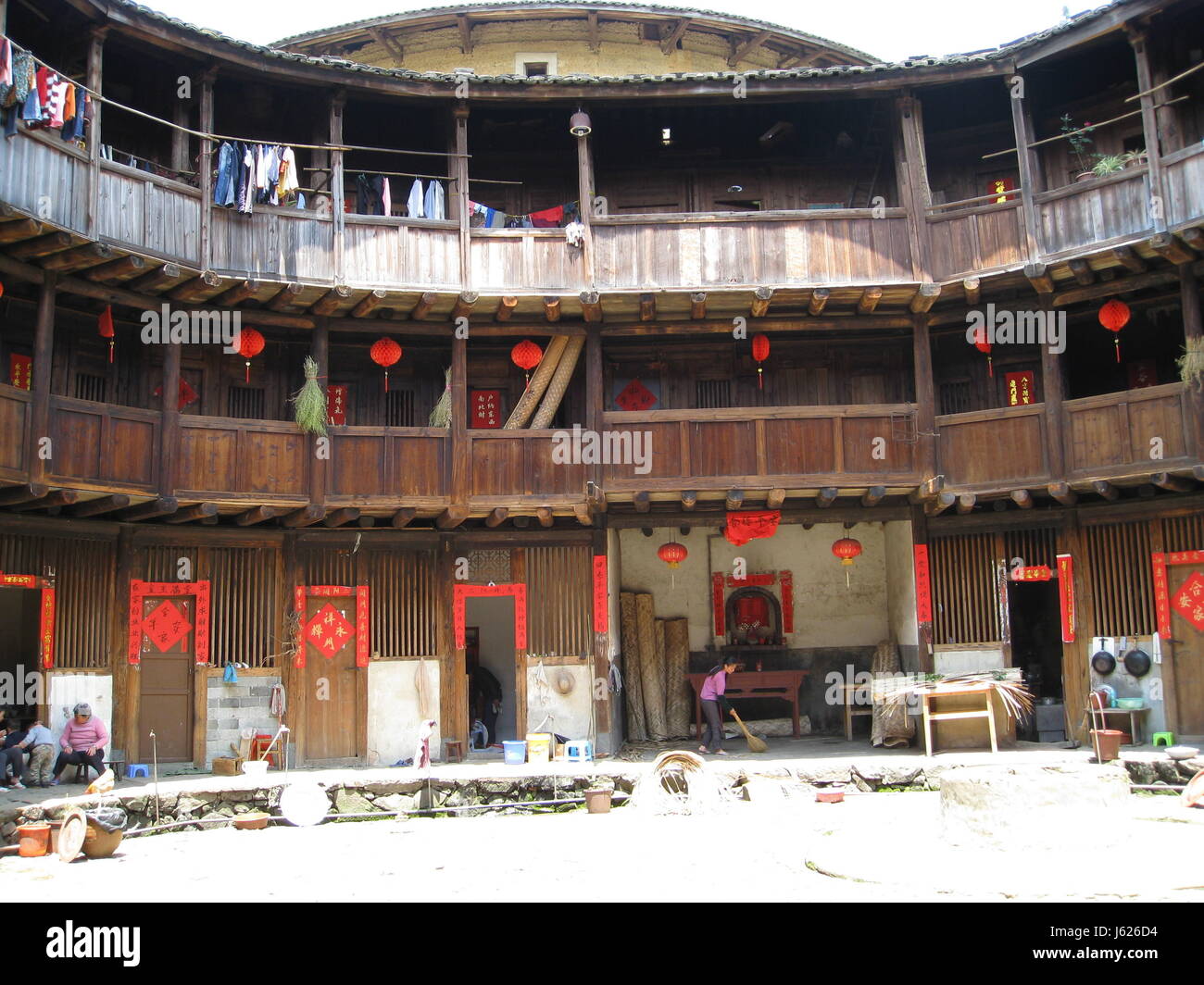 Zhangzh, Zhangzh, China. 18th May, 2017. Zhangzhou, CHINA-May 18 2017: (EDITORIAL USE ONLY. CHINA OUT) .The Nanjing tulou, also known as Nanjing earthen buildings, are Chinese rural dwellings unique to the Hakka in the mountainous areas in southeast China's Fujian Province. The architectures, were mostly built between the 12th and the 20th centuries. A total of 46 Fujian tulou sites were inscribed in 2008 by UNESCO as World Heritage Site, as ''exceptional examples of a building tradition and function exemplifying a particular type of communal living and defensive organization in a harmonious Stock Photo