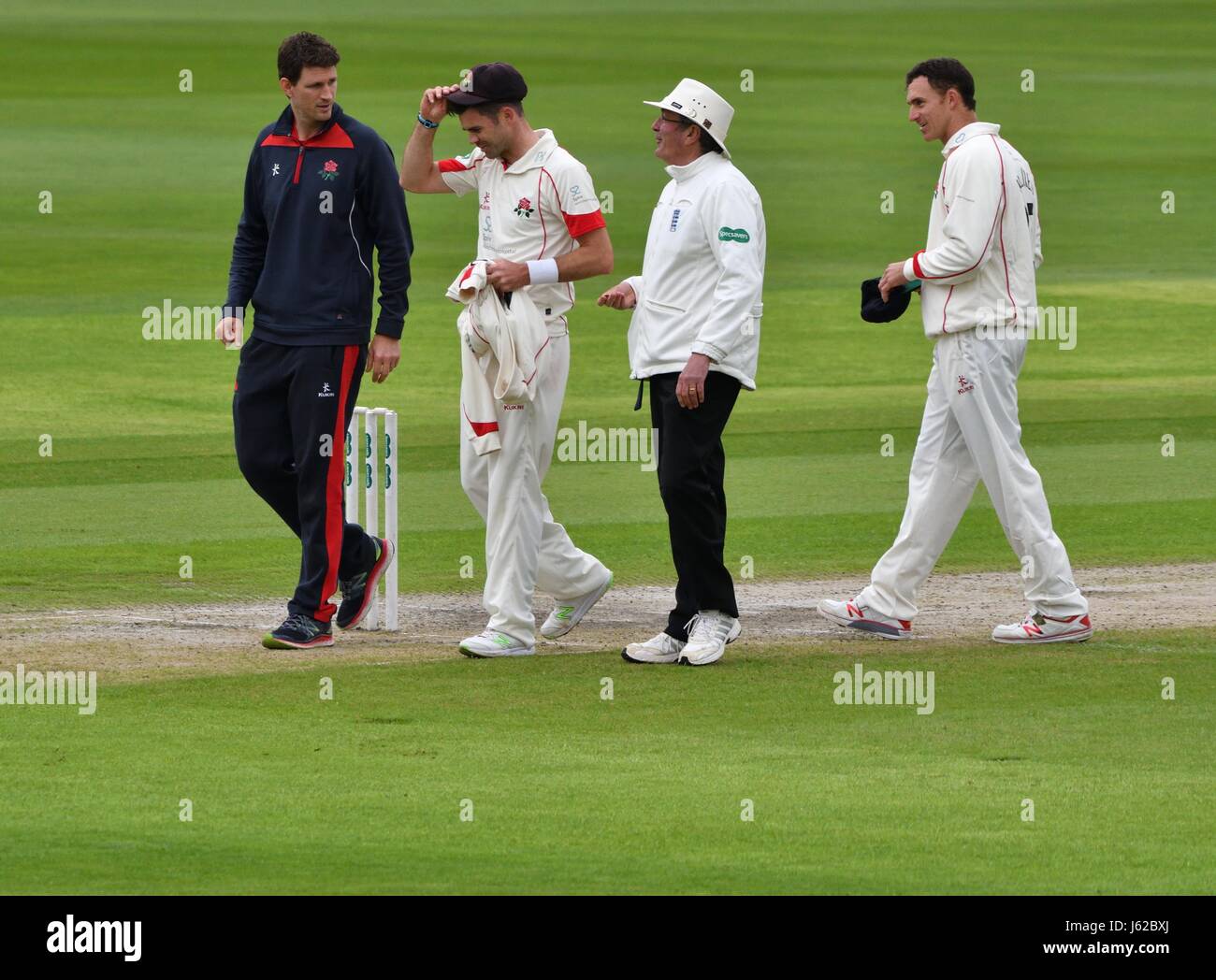 Manchester  UK  19th May 2017 James Anderson leaves the field after suffering a groin injury in his sixth over on the first day of the County Championship match for Lancashire against Yorkshire at Emirates Old Trafford. Stock Photo