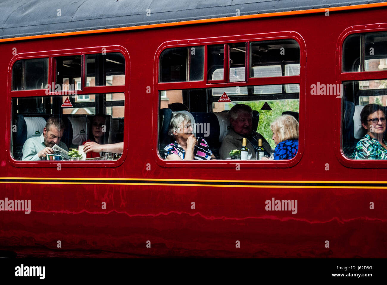 Hereford, Herefordshire. 19th May 2017. Passengers seen on board the Flying Scotsman as crowds gather to see Pacific steam locomotive LNER Class A3 4472 commonly known as the Flying Scotsman at Hereford railway station as it travels from Shrewsbury to Cardiff and then Newport to Bristol Parkway via Gloucester. The 94 year old Flying Scotsman was originally built in Doncaster for the London and North Eastern Railway (LNER), emerging from the works on 24 February 1923. Credit: Jim Wood/Alamy Live News Stock Photo