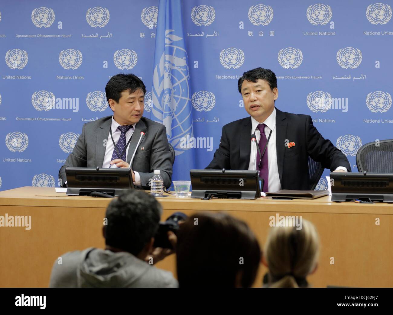 United Nations, New York, USA, May 19 2017 - Kim In Ryong (right), Deputy Permanent Representative of the Democratic Peoples Republic of Korea (DPRK) to the UN, briefs Journalists on the US Planning of Introducing more Sanctions at the Security Council Against his Country today at the UN Headquarters in New York. Photo: Luiz Rampelotto/EuropaNewswire | usage worldwide Stock Photo
