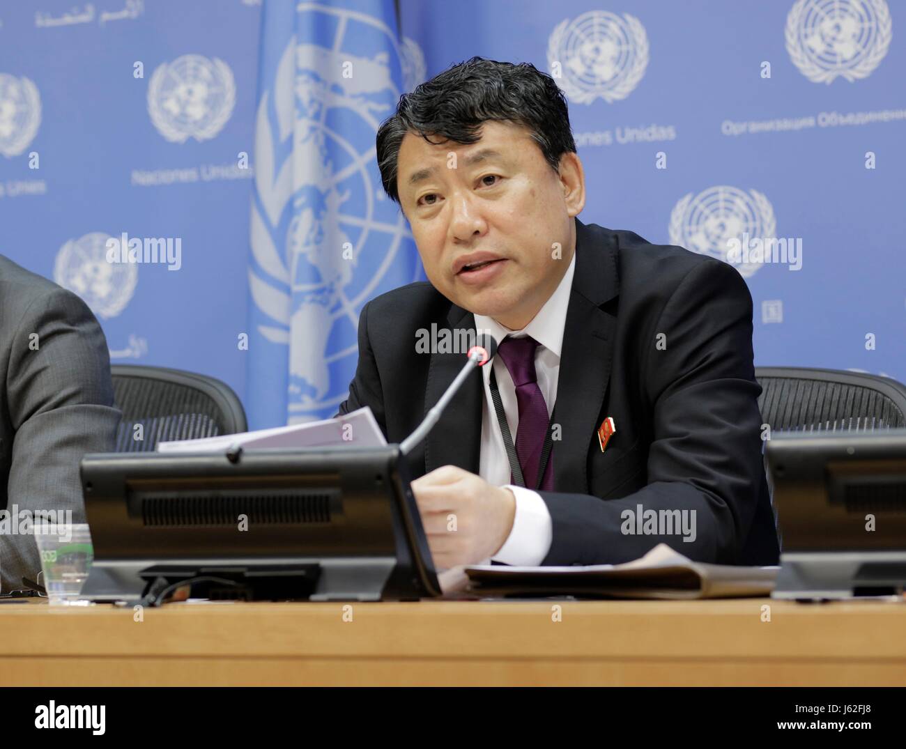 United Nations, New York, USA, May 19 2017 - Kim In Ryong (right), Deputy Permanent Representative of the Democratic Peoples Republic of Korea (DPRK) to the UN, briefs Journalists on the US Planning of Introducing more Sanctions at the Security Council Against his Country today at the UN Headquarters in New York. Photo: Luiz Rampelotto/EuropaNewswire | usage worldwide Stock Photo