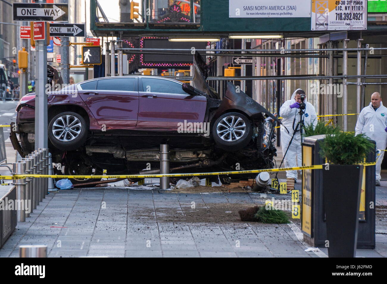 New York, New York, USA. 18th May, 2017. Emergency workers investigate the scene of a car crash in Times Square that took the life of an 18 year-old Michigan girl and injured 22 others. Credit: Kevin C. Downs/ZUMA Wire/ZUMAPRESS.com/Alamy Live News Stock Photo