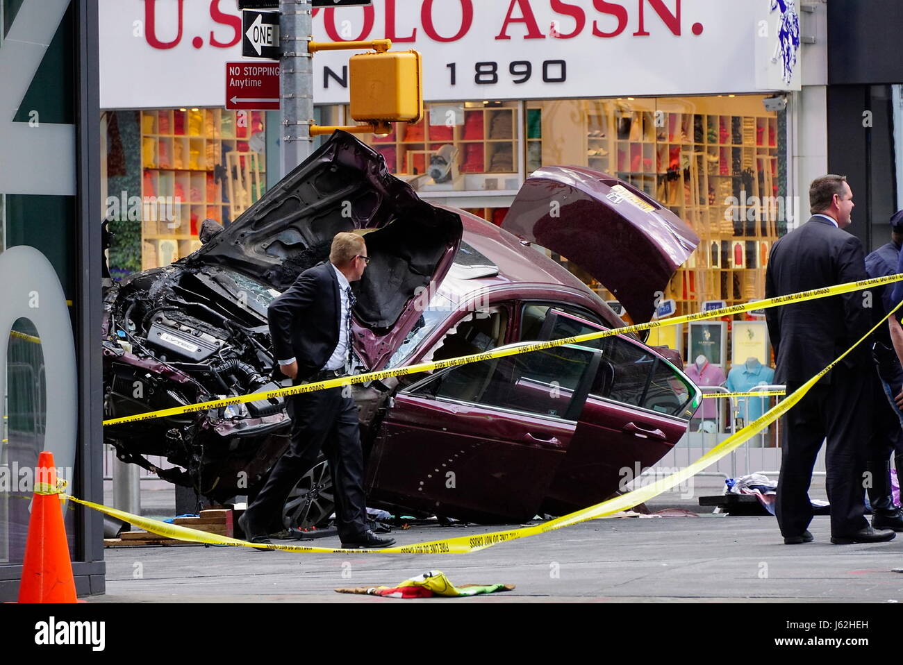 May 18, 2017 - New York, New York, U.S. - Police officers and emergency workers investigate the scene of a car crash in Times Square that took the life of an 18 year-old Michigan girl and injured 22 others. (Credit Image: © Kevin C. Downs/ZUMA Wire/ZUMAPRESS.com) Stock Photo