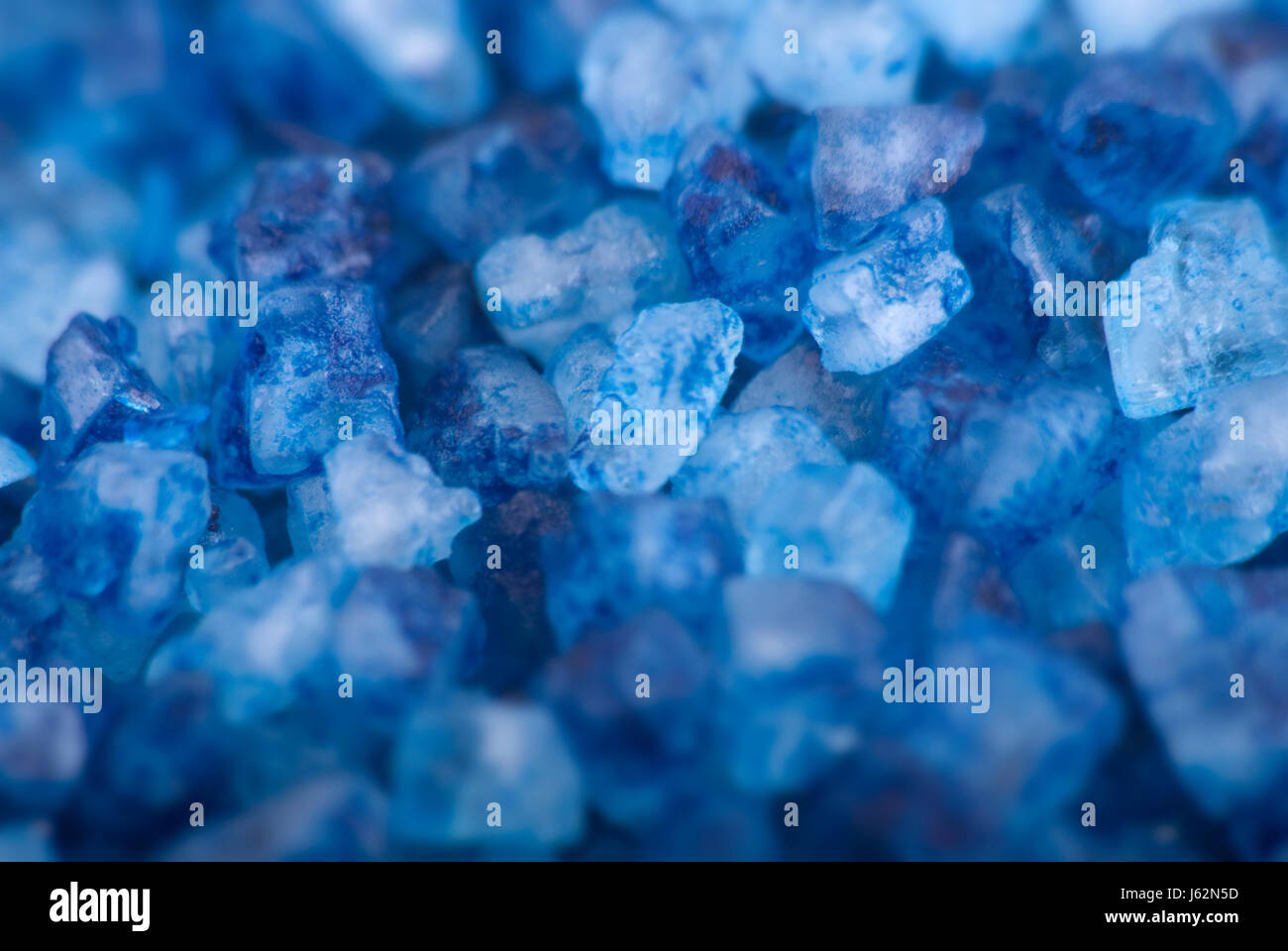 blue colour stone coloured crystal bluish crystals stones salt macro close-up Stock Photo