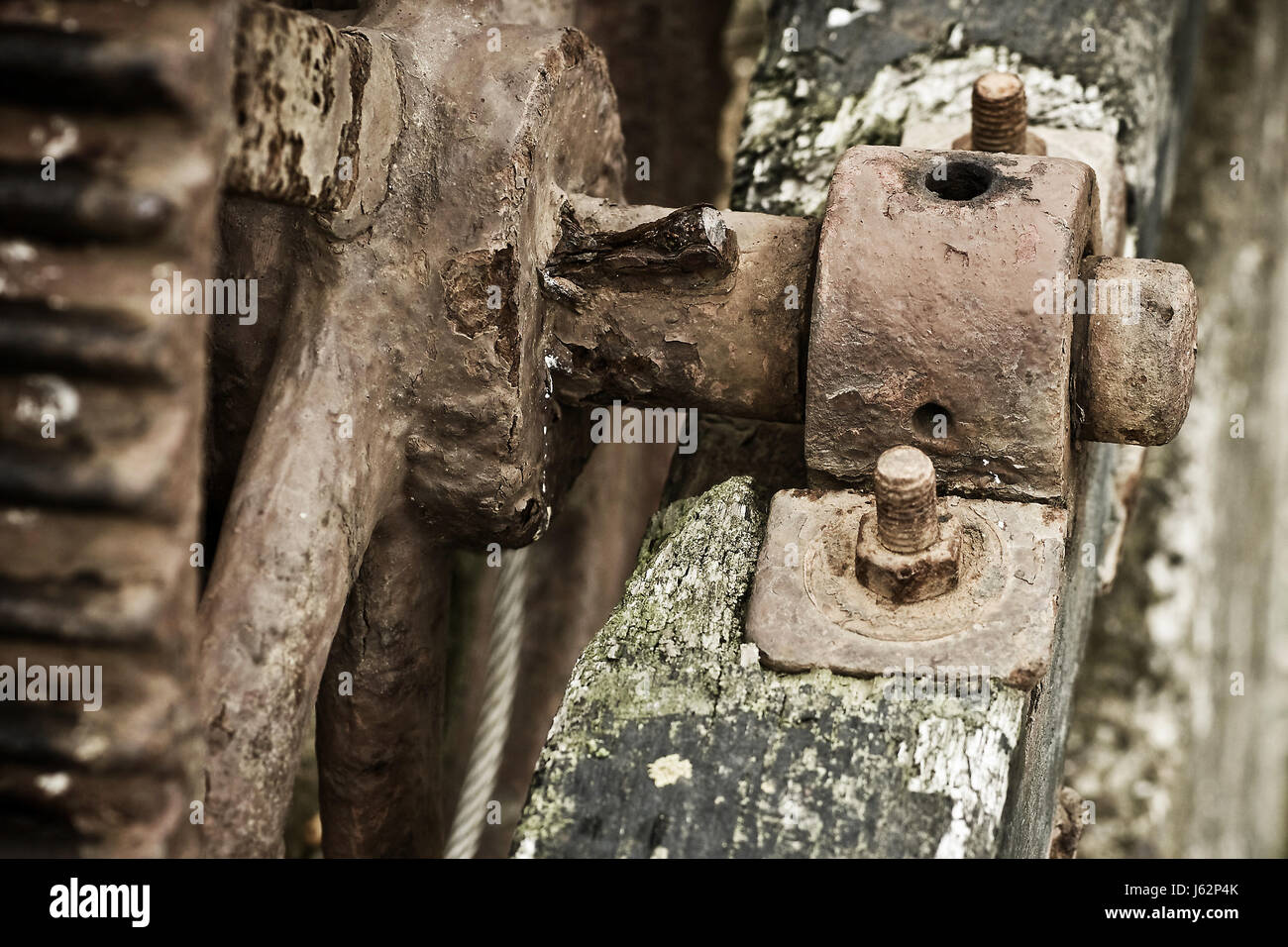 beam iron ailing disused winch axis verdigris age elder wheel beam iron ailing Stock Photo