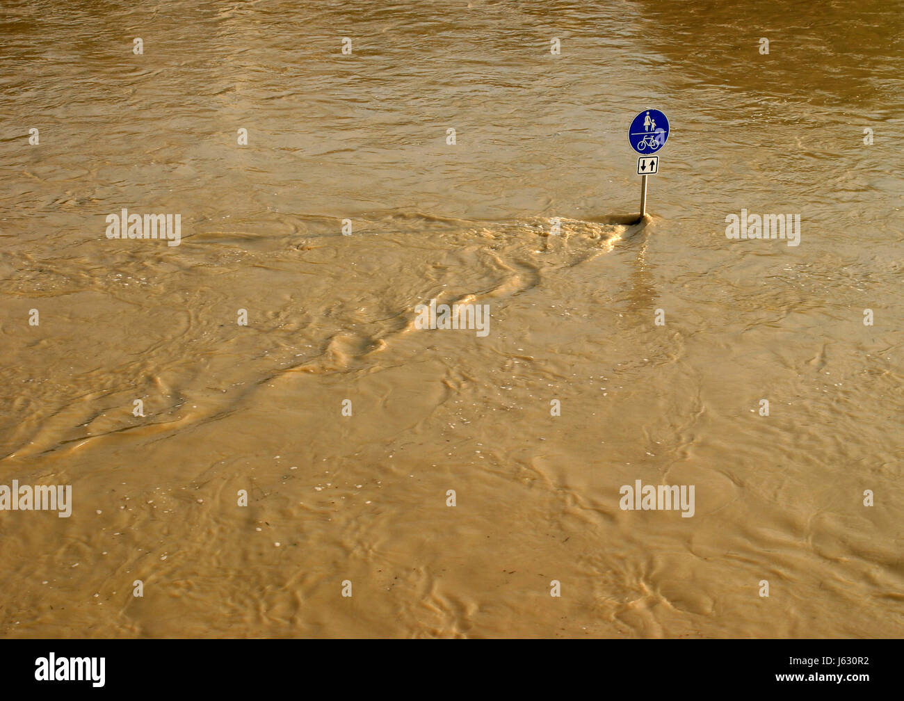 sign signal flood high tide traffic sign climate change rain raining sign Stock Photo