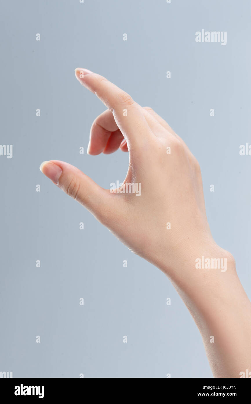 Hand holding up an index finger hi-res stock photography and images - Alamy