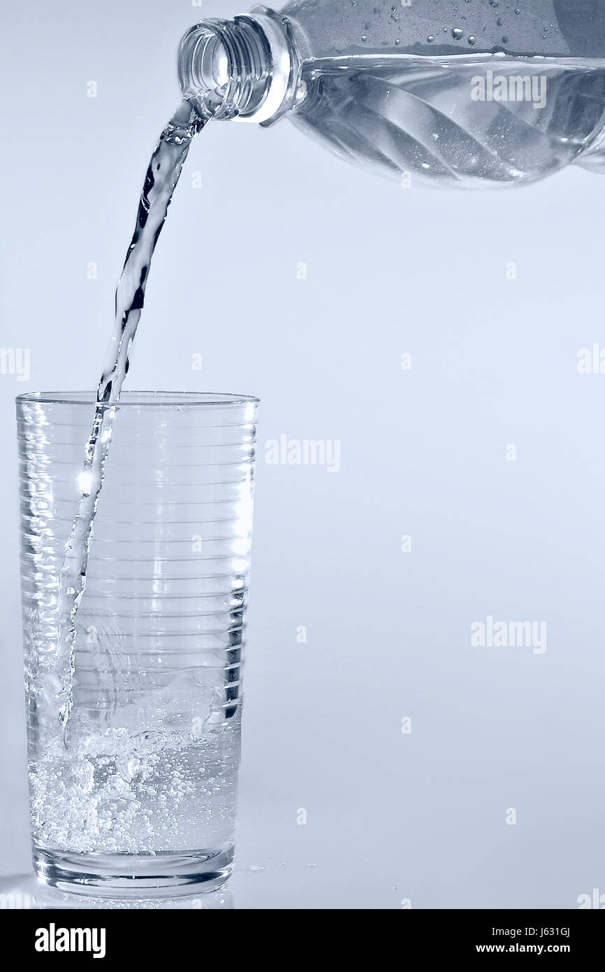 glass chalice tumbler soluble glass bottle mould fluid liquid wet water bottle Stock Photo
