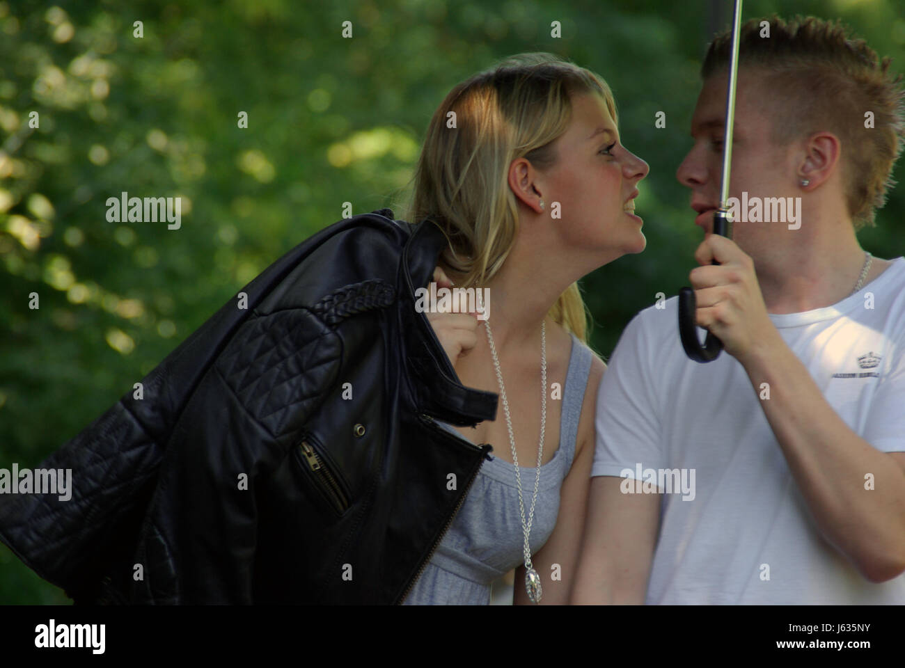 raving furious angry irately love in love fell in love young younger couple Stock Photo