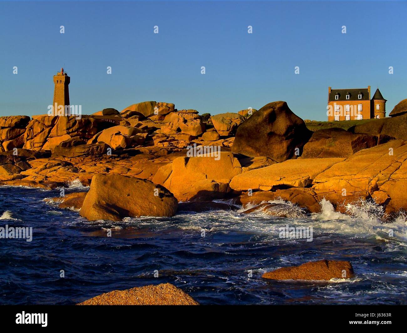 house building coast bay gout salt water sea ocean water blue tower