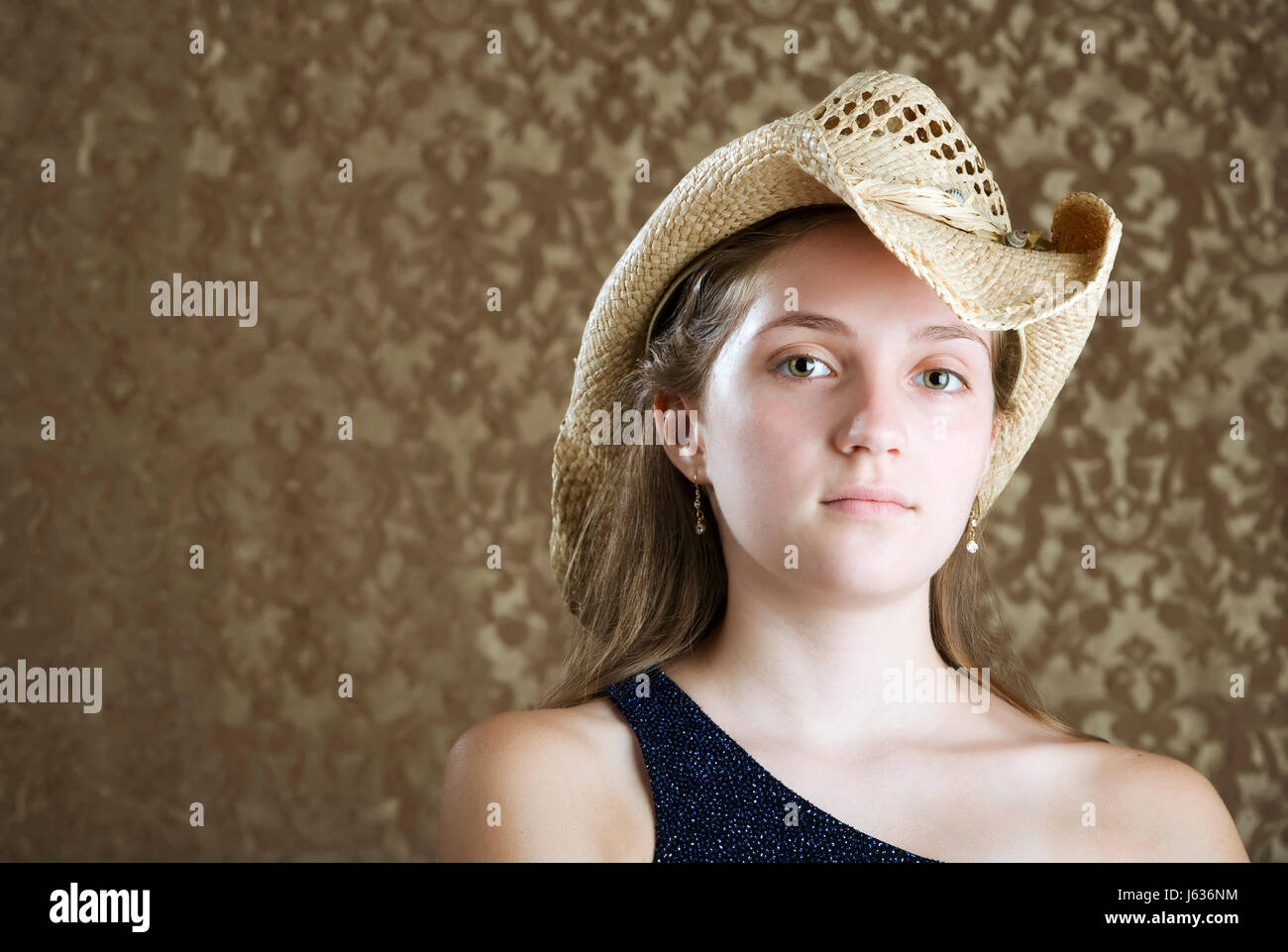 female teen hat cowboy country western dress girl girls gown female teen  hat Stock Photo - Alamy