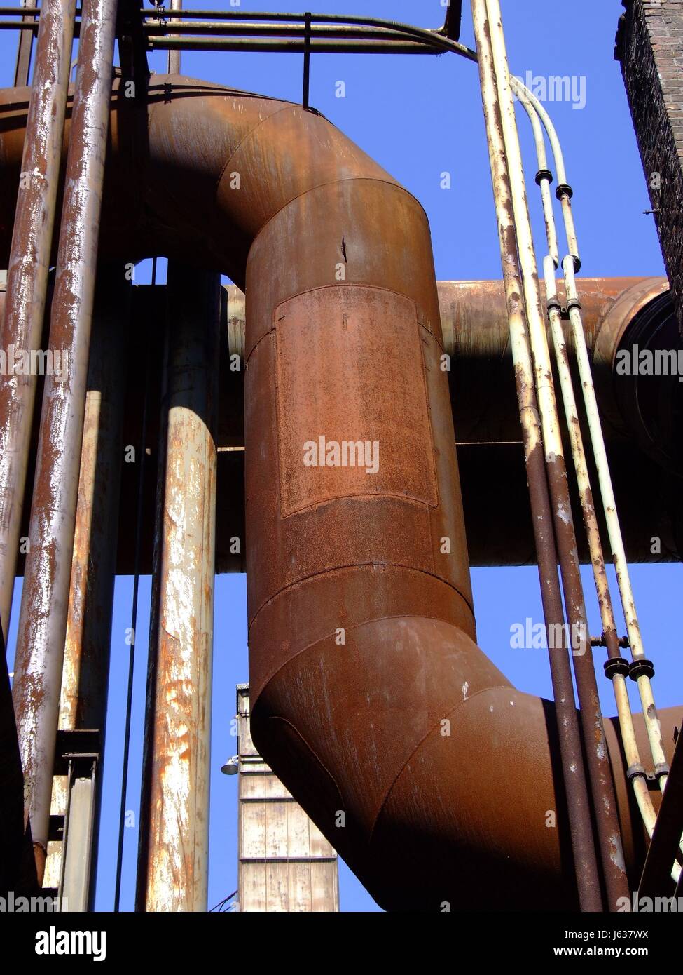 industry iron ruin rust smelting works Ruhr district tube pipe old blue Stock Photo